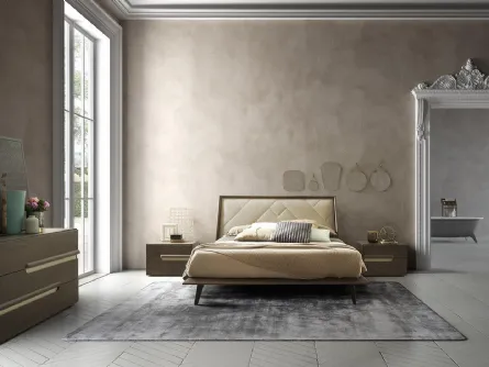 Letto in legno Cliff con testiera rivestita in pelle trapuntata di Mobilgam