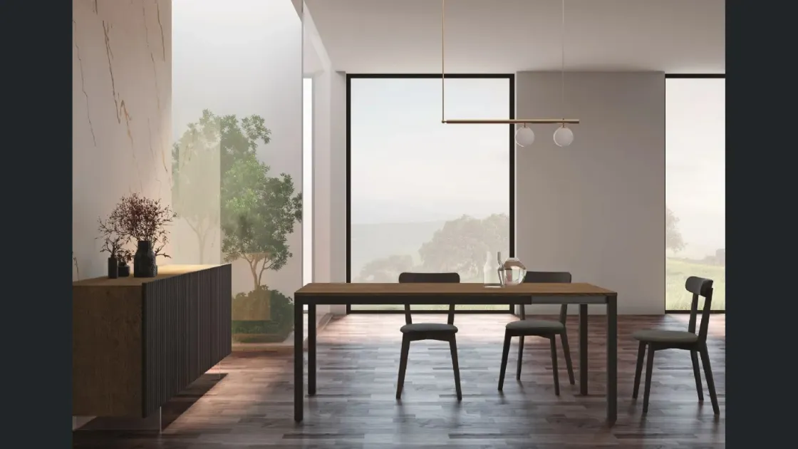 Tavolo allungabile Minimal con piano in rovere e struttura in metallo di Fratelli Mirandola